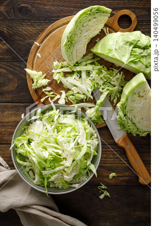 Cabbage cut and shredded. Fresh raw white chopped Cabbage Cabbage cut and shredded. Fresh raw white chopped Cabbage 140499056