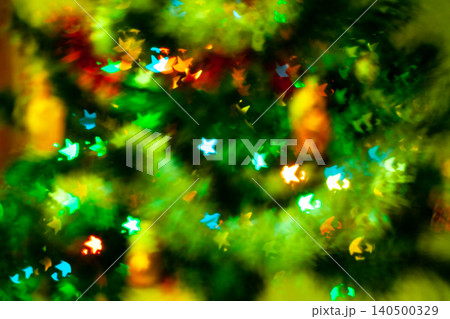 Blured sparks of light on cristmas tree, spruce lights on background Blured sparks of light on cristmas tree, spruce lights on background 140500329
