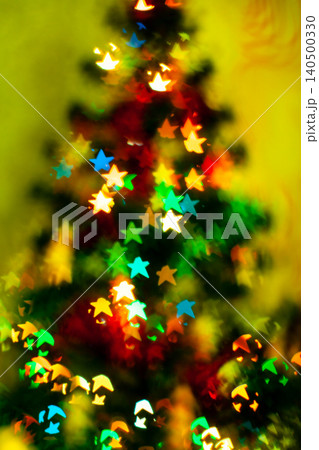 Blured sparks of light on cristmas tree, spruce lights on background Blured sparks of light on cristmas tree, spruce lights on background 140500330