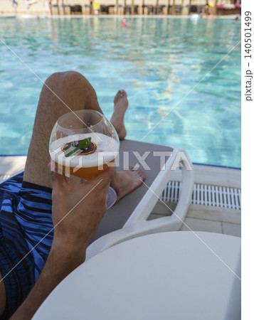 delicious cocktail by the pool 140501499