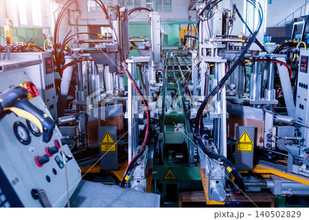 Factory for aluminum and PVC windows and doors production. Details industrial equipment. Factory for aluminum and PVC windows and doors production. Details industrial equipment. 140502829
