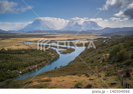 Patagonia mountain river valley under cloudy sky Patagonia mountain river valley under cloudy sky 140504098