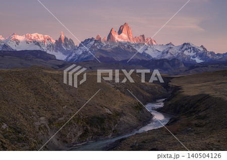 Patagonia mountain sunrise, river valley, snow peak, pink sky Patagonia mountain sunrise, river valley, snow peak, pink sky 140504126