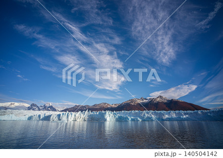 Perito moreno glacier patagonia los glaciares national park, blue ice cliff above lake under dramatic sky 140504142