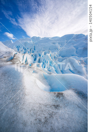 Perito moreno glacier patagonia los glaciares national park blue ice ridges under bright sky in wilderness Perito moreno glacier patagonia los glaciares national park blue ice ridges under bright sky in wilderness 140504154