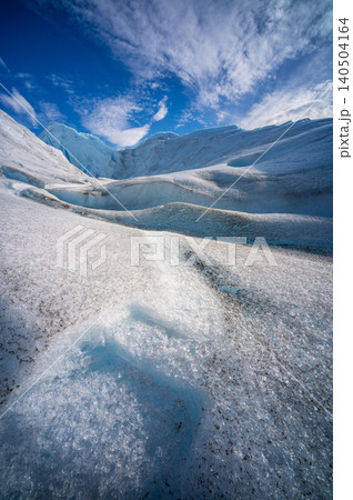 Perito moreno glaciers, blue ice glacier landscape, snowy glacier valley, icy mountain scene, frozen surface, dramatic sky 140504164