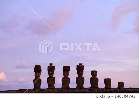Majestic moai statue row standing on easter island chile under serene twilight sky 140504748