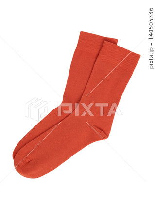 Bright Orange Socks on a White Background Showcasing Modern and Stylish Footwear Fashion 140505336