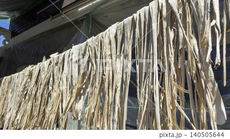 Drying a bark of  Broussonetia kazinoki mulberry tree that makes Korean traditional  paper 140505644