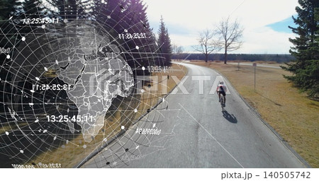 Riding cyclist in red jersey pedaling on park road with globe overlay, helmet, backpack, copy space Riding cyclist in red jersey pedaling on park road with globe overlay, helmet, backpack, copy space 140505742