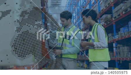 Scanning two workers wearing yellow vests in warehouse, holding scanner, digital overlay showing Scanning two workers wearing yellow vests in warehouse, holding scanner, digital overlay showing 140505975