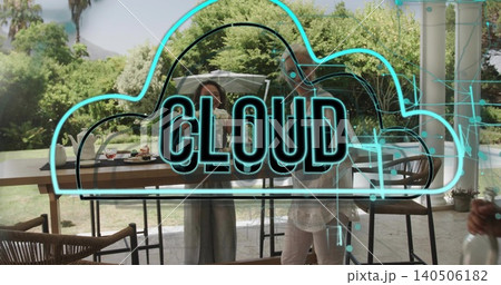 Floating neon cloud graphic reading CLOUD overlaying glass pane on patio, showing dining table Floating neon cloud graphic reading CLOUD overlaying glass pane on patio, showing dining table 140506182
