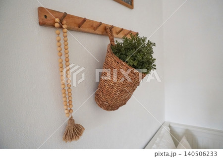 Beautifully Crafted Wall Hooks with Woven Basket and Greenery for Cozy Interior Decor Beautifully Crafted Wall Hooks with Woven Basket and Greenery for Cozy Interior Decor 140506233