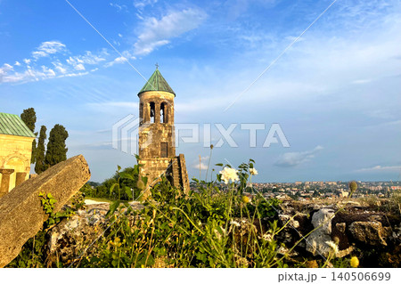 Summer Georgian landscape with Bagrati Cathedral and blue sky with clouds in Kutaisi Georgia Summer Georgian landscape with Bagrati Cathedral and blue sky with clouds in Kutaisi Georgia 140506699