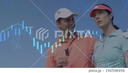 Smiling two golfers on golf course wearing polos and visor, holding putter with financial chart 140506956