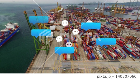 Showing aerial seaport container yard with container stacks, gantry cranes, ship, blue overlays Showing aerial seaport container yard with container stacks, gantry cranes, ship, blue overlays 140507060
