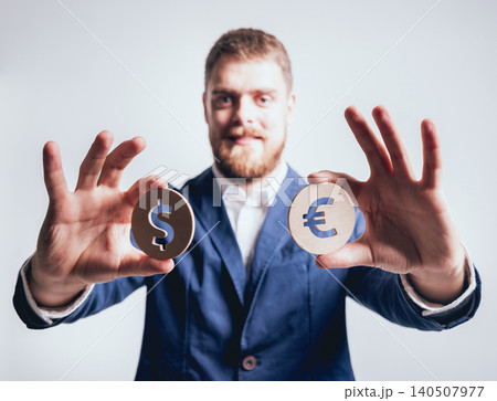Businessman holds a coins at the hands. Money box. Collecting money with earning bank. Businessman holds a coins at the hands. Money box. Collecting money with earning bank. 140507977