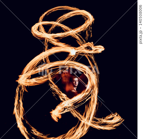 Fire show. Fire performance at the night. Fire show. Fire performance at the night. 140508006