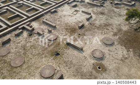 Harappa home ruins with circular dye and grain platforms aerial view 140508443