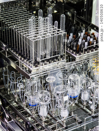 Test tubes and glassware stored in a laboratory setup for cleaning after use Test tubes and glassware stored in a laboratory setup for cleaning after use 140508610