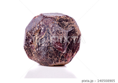 Macro of a mineral garnet stone on a white background 140508905