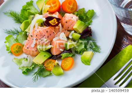 Ceviche of salmon with avocado, kumquat and dill Ceviche of salmon with avocado, kumquat and dill 140509459