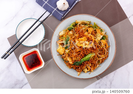 Homestyle Stir-Fried Noodles with Egg and Vegetables, Chinese Comfort Food Homestyle Stir-Fried Noodles with Egg and Vegetables, Chinese Comfort Food 140509760