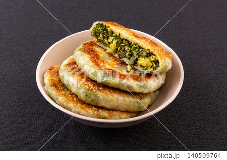 Traditional Chinese Shepherds Purse and Egg Stuffed Pancakes, Savory Flatbread Snack Traditional Chinese Shepherds Purse and Egg Stuffed Pancakes, Savory Flatbread Snack 140509764