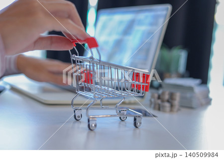Businessman shopping online, paying bills and digital banking online with credit card and laptop. Businessman shopping online, paying bills and digital banking online with credit card and laptop. 140509984