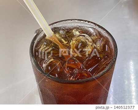 Iced Teh O close-up with ice cubes and condensation on glass 140512377