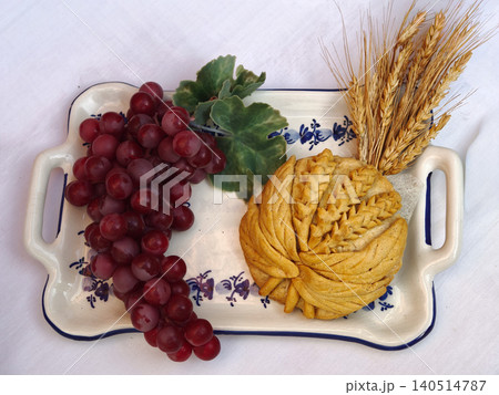 Grapes, wheat, and bread representing holy communion Grapes, wheat, and bread representing holy communion 140514787