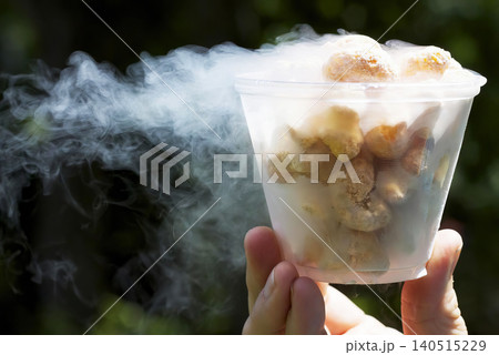 Dragon's breath liquid nitrogen snack with smoke and vapor effect. Dragon's breath liquid nitrogen snack with smoke and vapor effect. 140515229