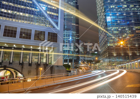Night Traffic Between Skyscrapers of Hong Kong City Night Traffic Between Skyscrapers of Hong Kong City 140515439