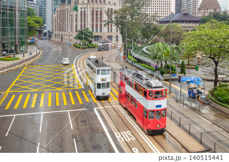 Double-Decker Trams at a Hong Kong City Intersection Double-Decker Trams at a Hong Kong City Intersection 140515441