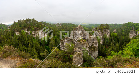 Rock city formations in Hruboskalsko, Bohemian Paradise (Cesky raj), Czech Republic, with peaks of giant sandstone rocks and cliffs emerging from light morning mist panoramic view Rock city formations in Hruboskalsko, Bohemian Paradise (Cesky raj), Czech Republic, with peaks of giant sandstone rocks and cliffs emerging from light morning mist panoramic view 140515621