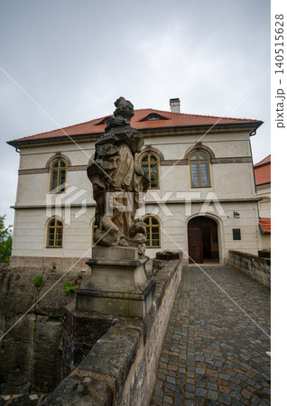 Exterior of Valdstejn Castle (Hrad Valdstejn) in Hruba Skala, Bohemian Paradise (Cesky raj), Czech Republic. historic sandstone castle exterior overlooking valley forest landscapes Exterior of Valdstejn Castle (Hrad Valdstejn) in Hruba Skala, Bohemian Paradise (Cesky raj), Czech Republic. historic sandstone castle exterior overlooking valley forest landscapes 140515628