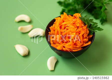 Traditional Korean carrot salad with fresh parsley garnish Traditional Korean carrot salad with fresh parsley garnish 140515982