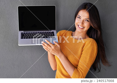 Woman, portrait and laptop screen in studio, empty and mockup space for website or app. Female person, communication and blank display for marketing or advertising, social media and gray background Woman, portrait and laptop screen in studio, empty and mockup space for website or app. Female person, communication and blank display for marketing or advertising, social media and gray background 140517008