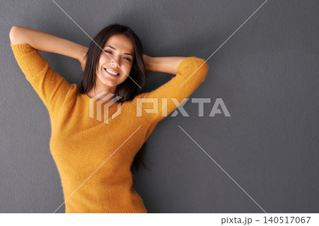 Fashion, female model and relax in portrait or studio, trendy style or cool in gray background. Woman, smile and happy with confidence in mockup space, stylish and pullover for casual outfit Fashion, female model and relax in portrait or studio, trendy style or cool in gray background. Woman, smile and happy with confidence in mockup space, stylish and pullover for casual outfit 140517067