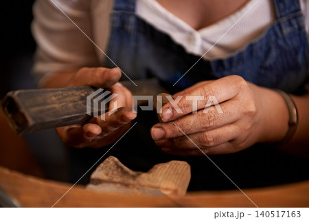 Woodworking, industry and hands of woman in workshop for creative project or sculpture. Artisan, industrial and closeup of female carpenter manufacturing products in studio for small business. Woodworking, industry and hands of woman in workshop for creative project or sculpture. Artisan, industrial and closeup of female carpenter manufacturing products in studio for small business. 140517163