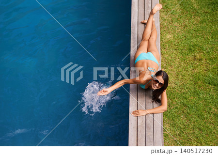 Portrait of woman, water or tan at swimming pool to relax or chill in summer holiday vacation in Hawaii. Smile, break or happy female person sunbathing in a bikini at resort, home or hotel for splash 140517230