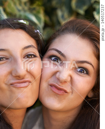 Girl friends, happy and selfie outdoor with silly, pout and students with a smile in a park. Garden, youth and funny face with grass, campus and fun together with bonding in nature with teen people Girl friends, happy and selfie outdoor with silly, pout and students with a smile in a park. Garden, youth and funny face with grass, campus and fun together with bonding in nature with teen people 140517237
