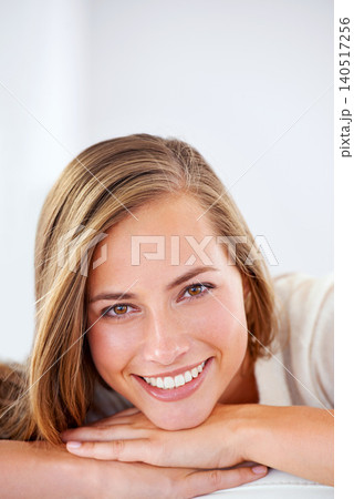 Happy, woman and relax in portrait with beauty or natural makeup in home or white background. Girl, smile and model with pride, confidence and glow on face from skincare, dermatology or cosmetics Happy, woman and relax in portrait with beauty or natural makeup in home or white background. Girl, smile and model with pride, confidence and glow on face from skincare, dermatology or cosmetics 140517256