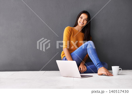 Woman, laptop and portrait or tea in home, web and cup of caffeine on floor of living room. Female person, mockup space and wall background for freelancer, plan and remote work in apartment on app Woman, laptop and portrait or tea in home, web and cup of caffeine on floor of living room. Female person, mockup space and wall background for freelancer, plan and remote work in apartment on app 140517430
