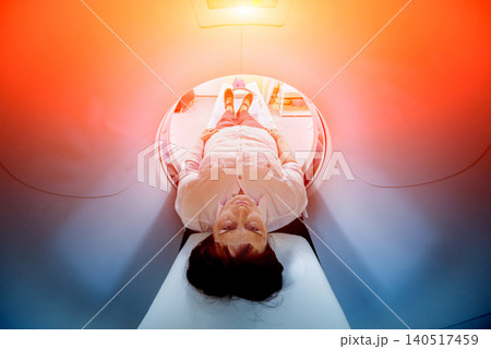 Doctor and patient in the room of computed tomography at hospital. Doctor and patient in the room of computed tomography at hospital. 140517459