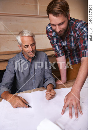 Architects, collaboration and men with blueprint in office for building, construction or repairs. Engineering, design and industrial apprentice planning and working on industry project with mentor. Architects, collaboration and men with blueprint in office for building, construction or repairs. Engineering, design and industrial apprentice planning and working on industry project with mentor. 140517503