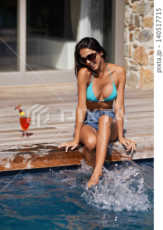 Woman, bikini and swimming pool with cocktail at hotel resort in Hawaii fr travel holiday, vacation or stress relief. Female person, water and relax or summer tan or tropical sunshine, trip or joy Woman, bikini and swimming pool with cocktail at hotel resort in Hawaii fr travel holiday, vacation or stress relief. Female person, water and relax or summer tan or tropical sunshine, trip or joy 140517715