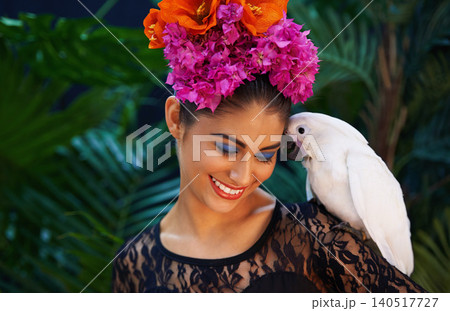Jungle, parrot or woman with flowers for beauty, natural cosmetics or wellness in nature aesthetic. Happy, Indian person or model with eco friendly skincare, bird or spring dermatology floral art 140517727