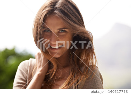 Woman, beauty and closeup for portrait, outdoor and smile in nature environment with wavy hair. Female person, happy and confidence in outside, summer and garden background for relaxation and park 140517758