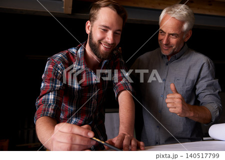Architect, team and happy men with blueprint, thumbs up or planning construction with father teaching son. Engineer, smile and like hand gesture of senior mentor with apprentice drawing in workshop Architect, team and happy men with blueprint, thumbs up or planning construction with father teaching son. Engineer, smile and like hand gesture of senior mentor with apprentice drawing in workshop 140517799